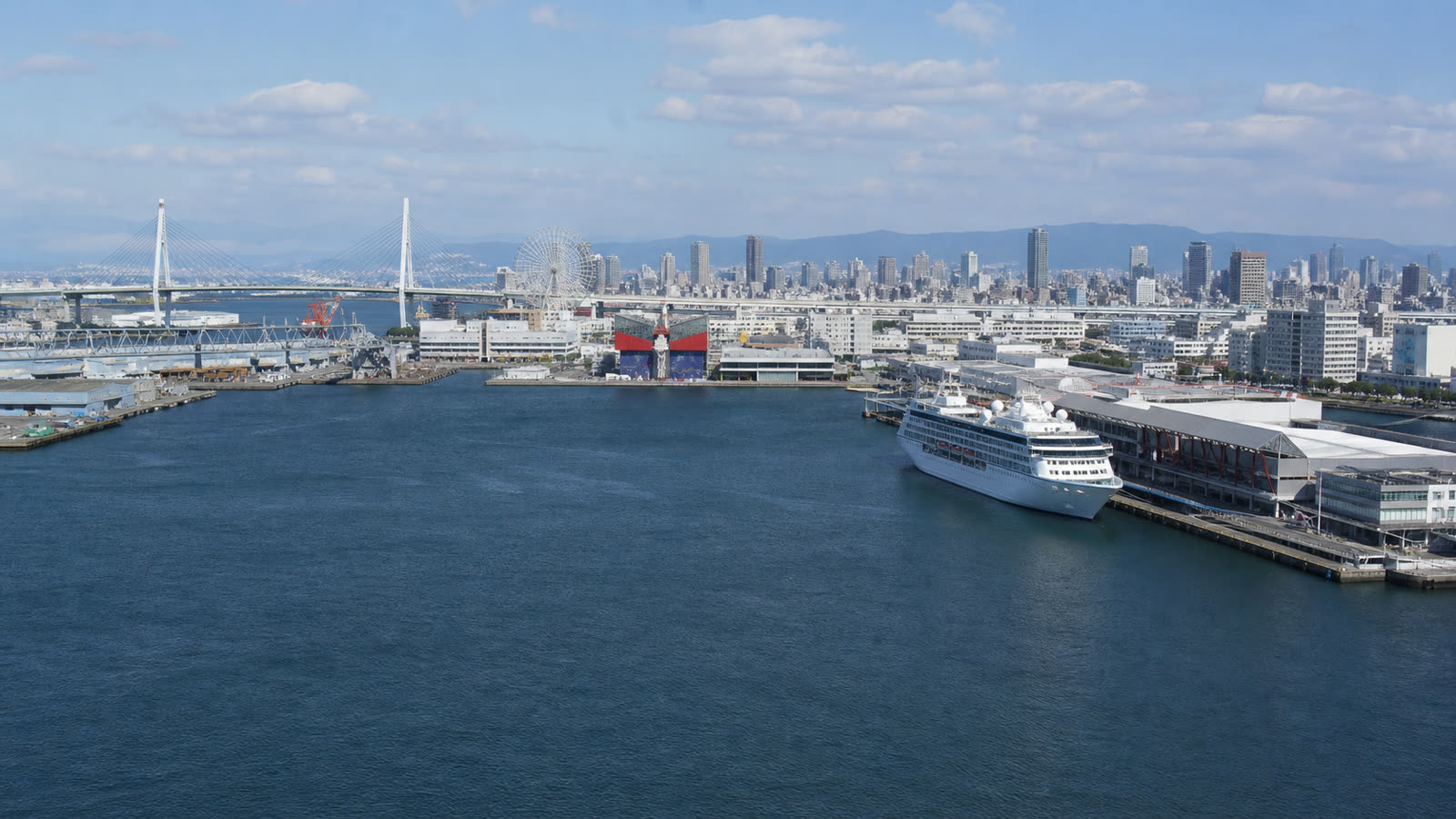 Osaka cruise harbor with an unbranded ship and the city waterfront at realistic scale