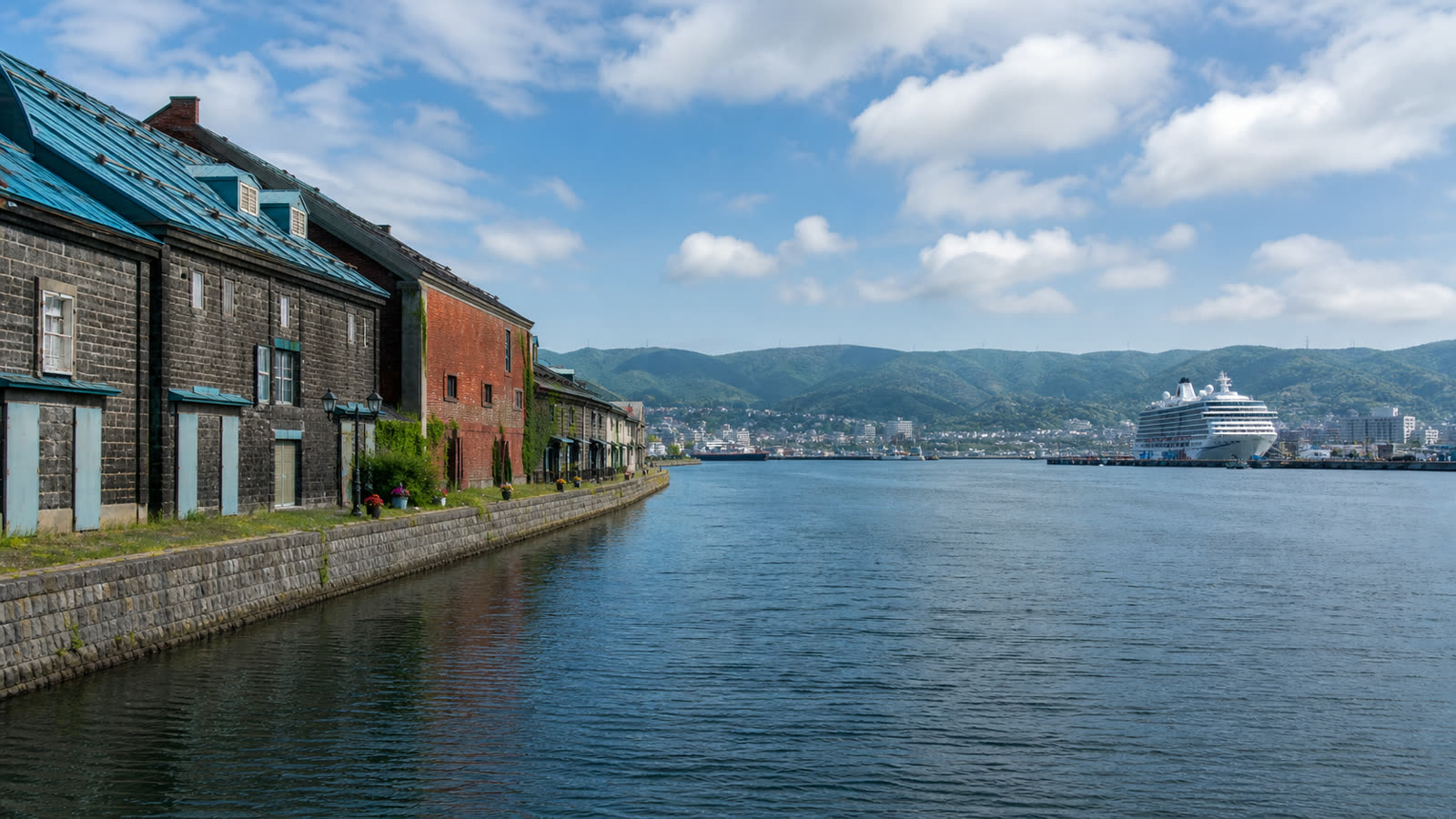 Otaru cruise harbor and historic waterfront with an unbranded ship