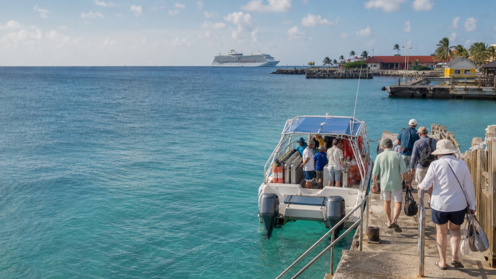 Travelers boarding a small boat for a Caribbean shore excursion