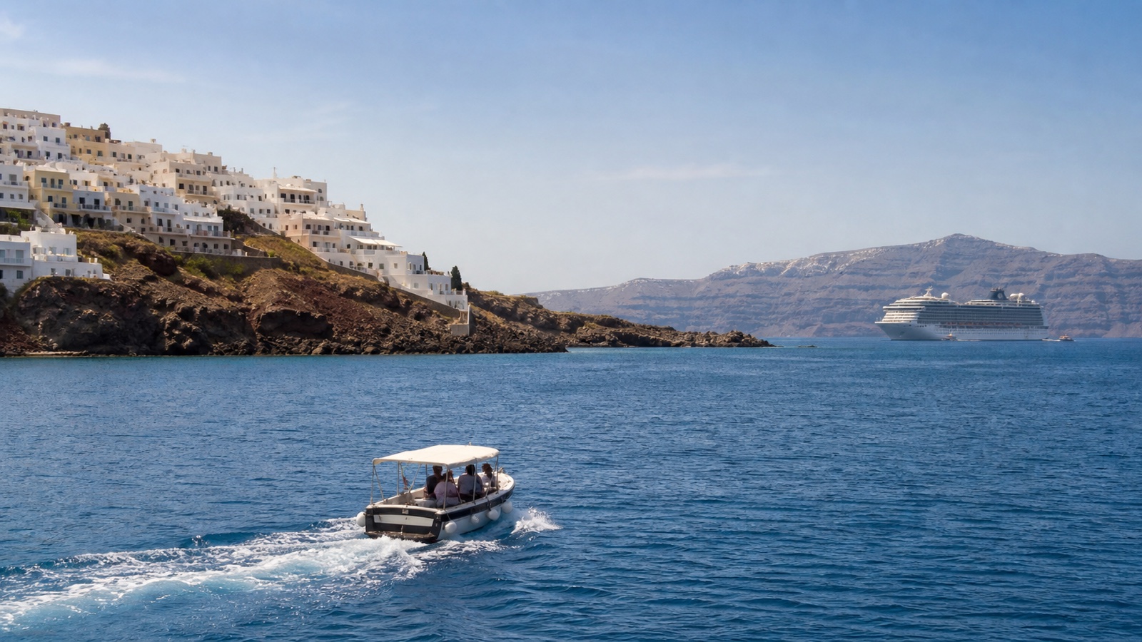 Small boat approaching a whitewashed Aegean island village with an unbranded cruise ship offshore