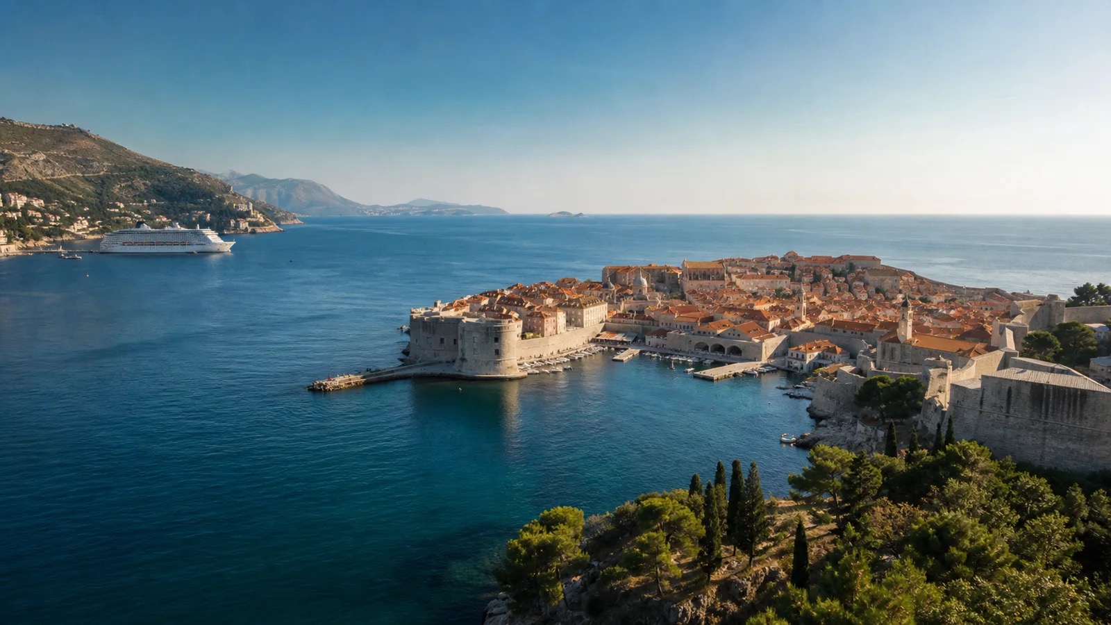 Dubrovnik Old City on the Adriatic with an unbranded cruise ship near the wider port