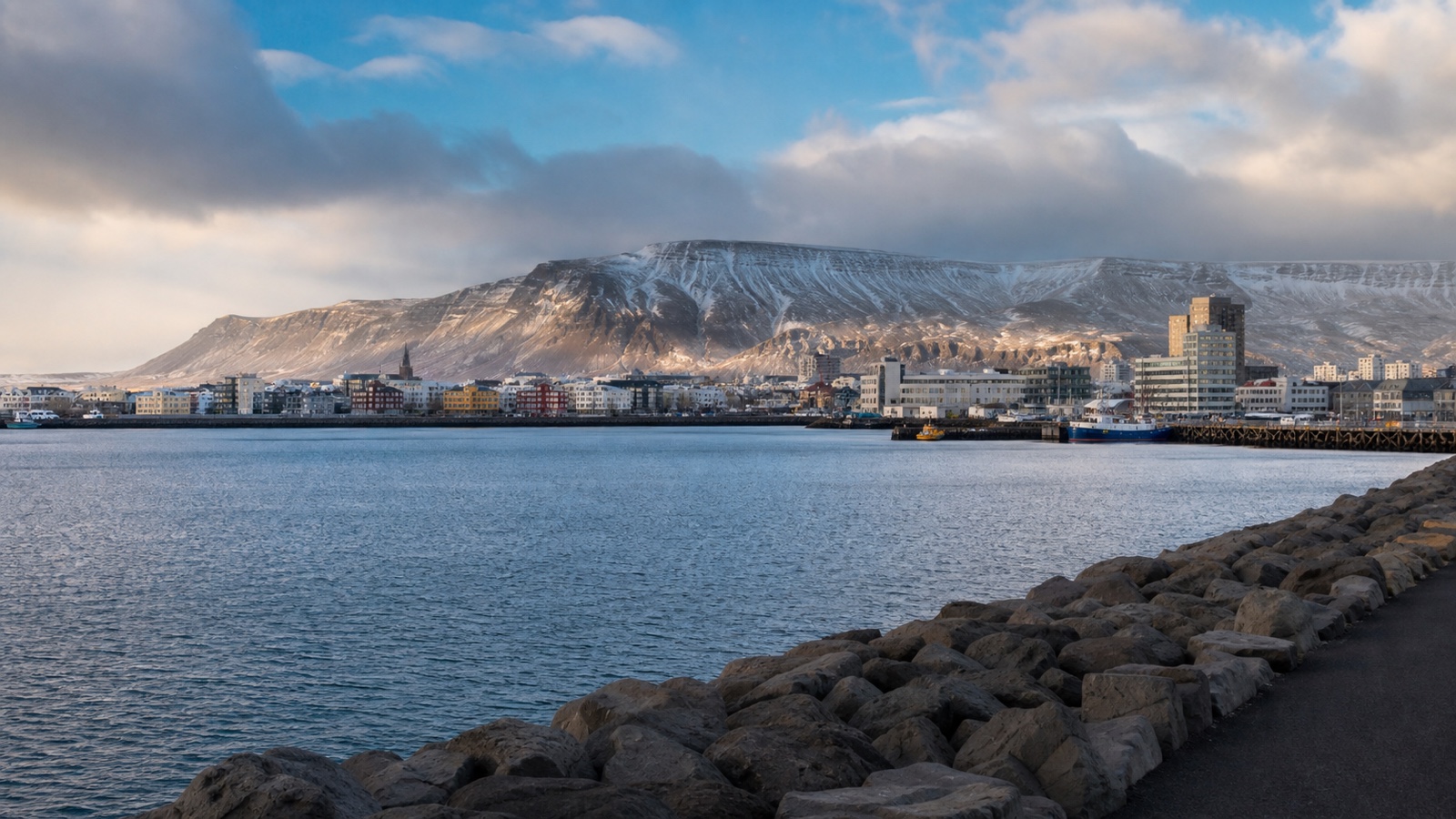 Reykjavík cruise harbor with an unbranded ship and mountains beyond