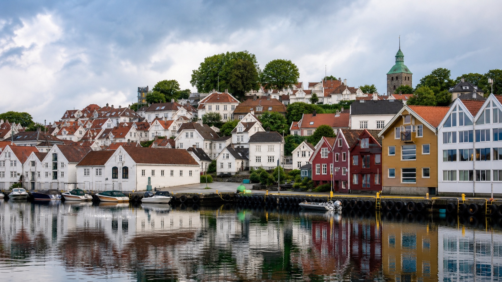 Stavanger harbor and old town with an unbranded cruise ship