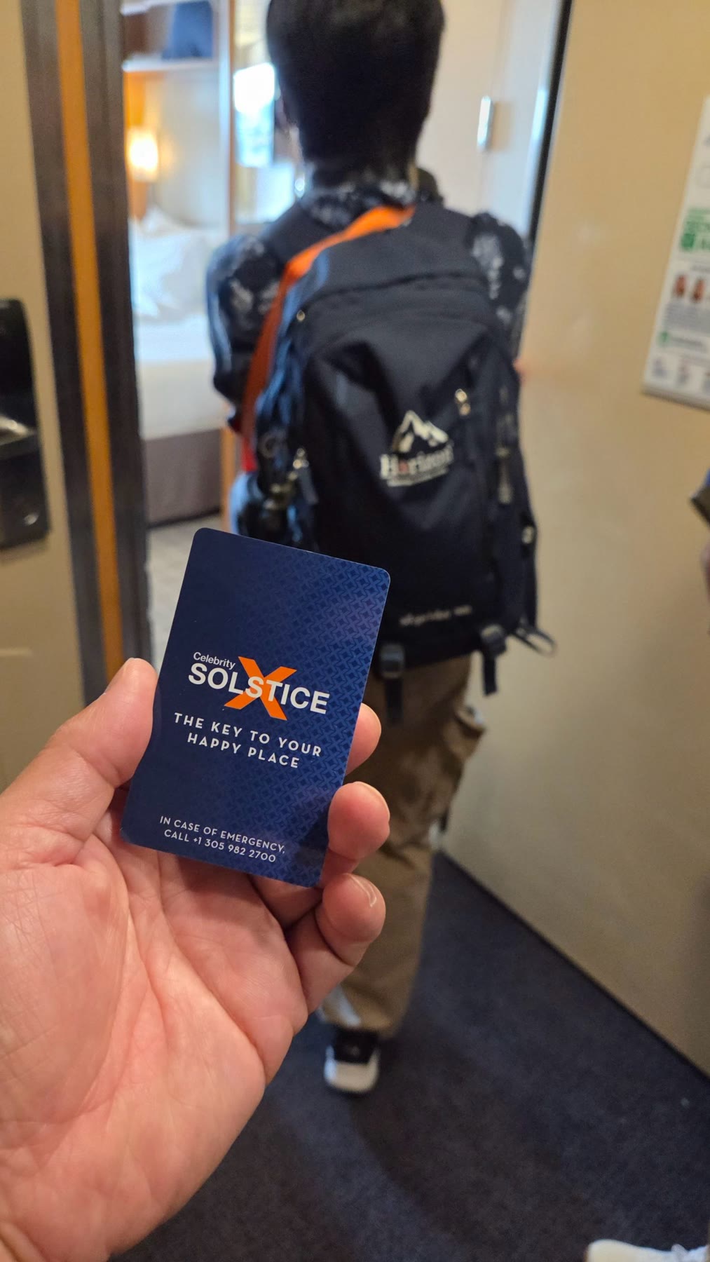 Celebrity Solstice cabin key held while entering the room on embarkation day